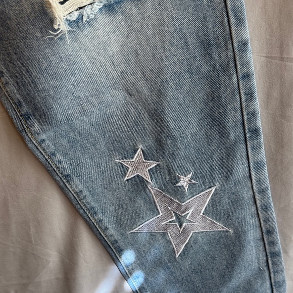 Ripped Jeans with Star Accents - Picture 4 of 16